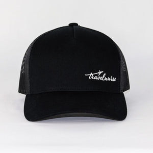 Product photo showing a black mesh back hat with a white travel nurse logo